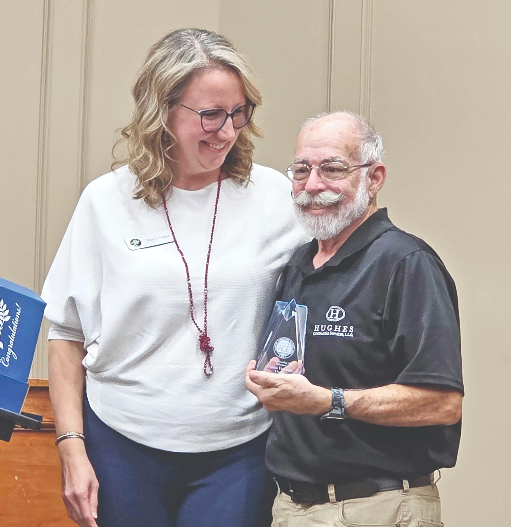 Ozark honors Charles Veneziano with ACE award; council approves civic center beverage bid with conditions